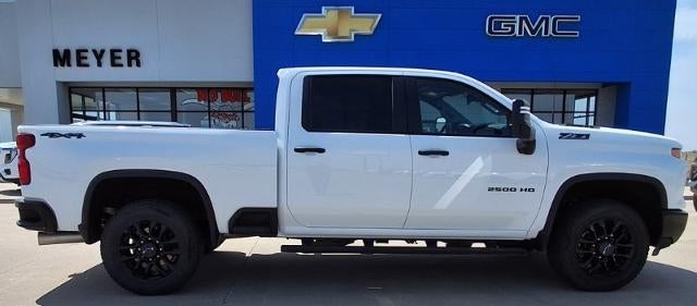2025 Chevrolet Silverado 2500 HD Custom in Summit White — front three-quarter view