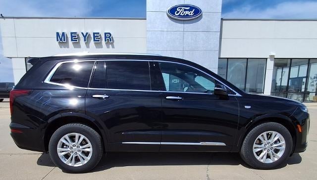2024 Cadillac XT6 Luxury in Stellar Black Metallic — front three-quarter view